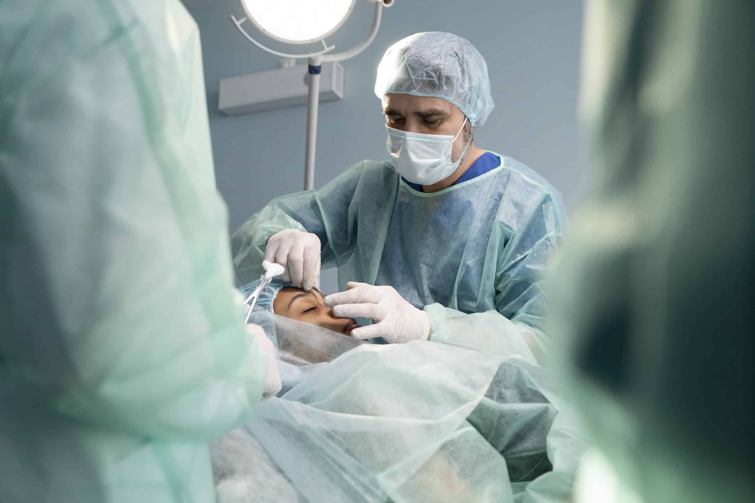 Tampa plastic surgery SEO agency — board-certified plastic surgeon performing rhinoplasty in an accredited Tampa Bay surgical facility