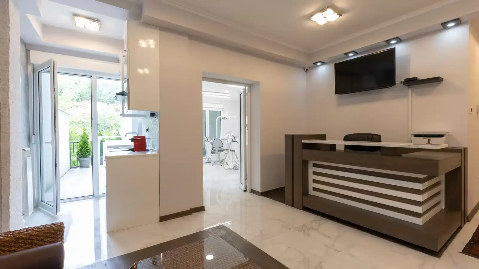 A clean, modern aesthetic clinic reception area, representing the booking destination a well-converting website delivers patients to.