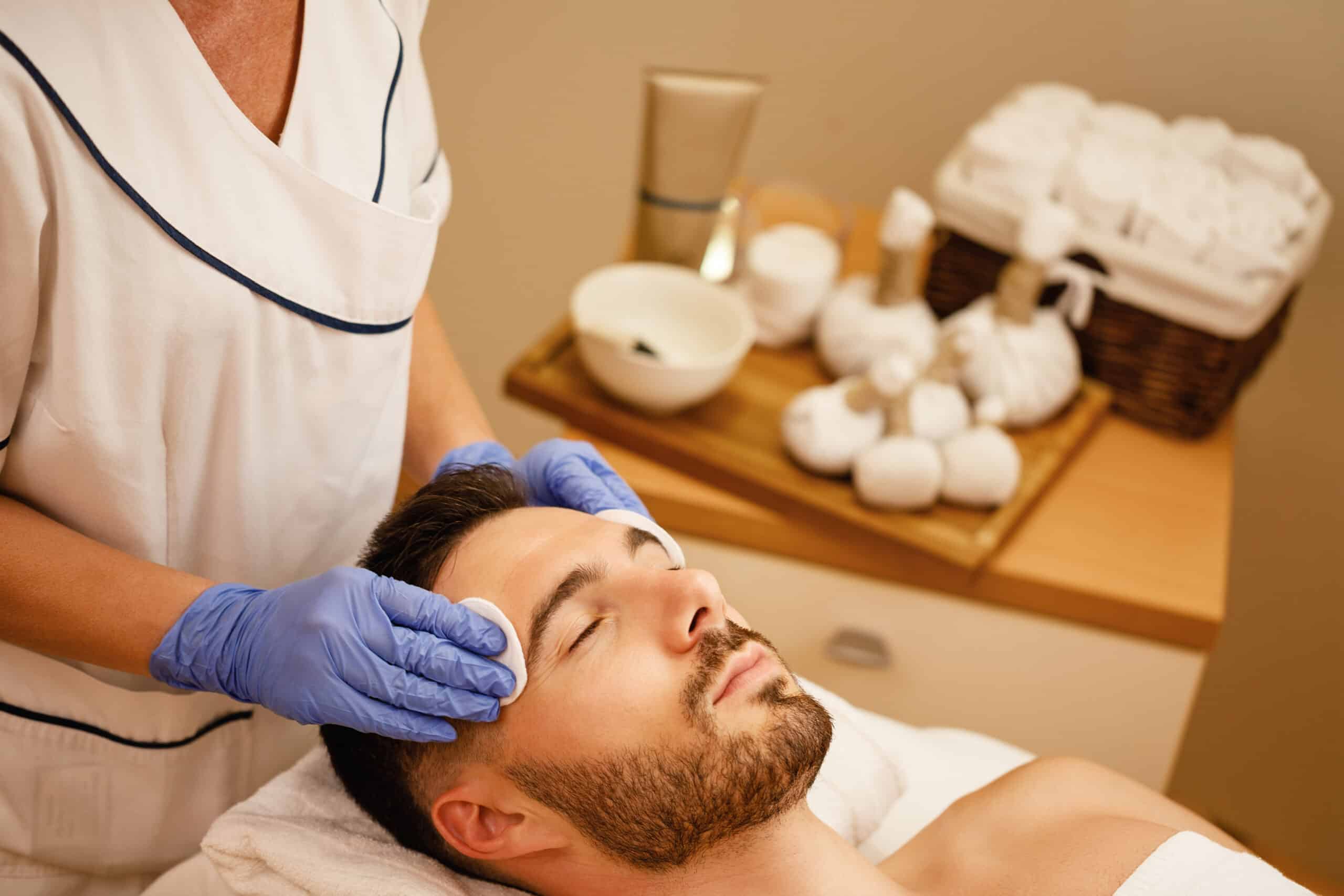Tampa male patient researching men's aesthetic procedures privately on mobile — the stealth-research pattern that defines male aesthetic patient behavior