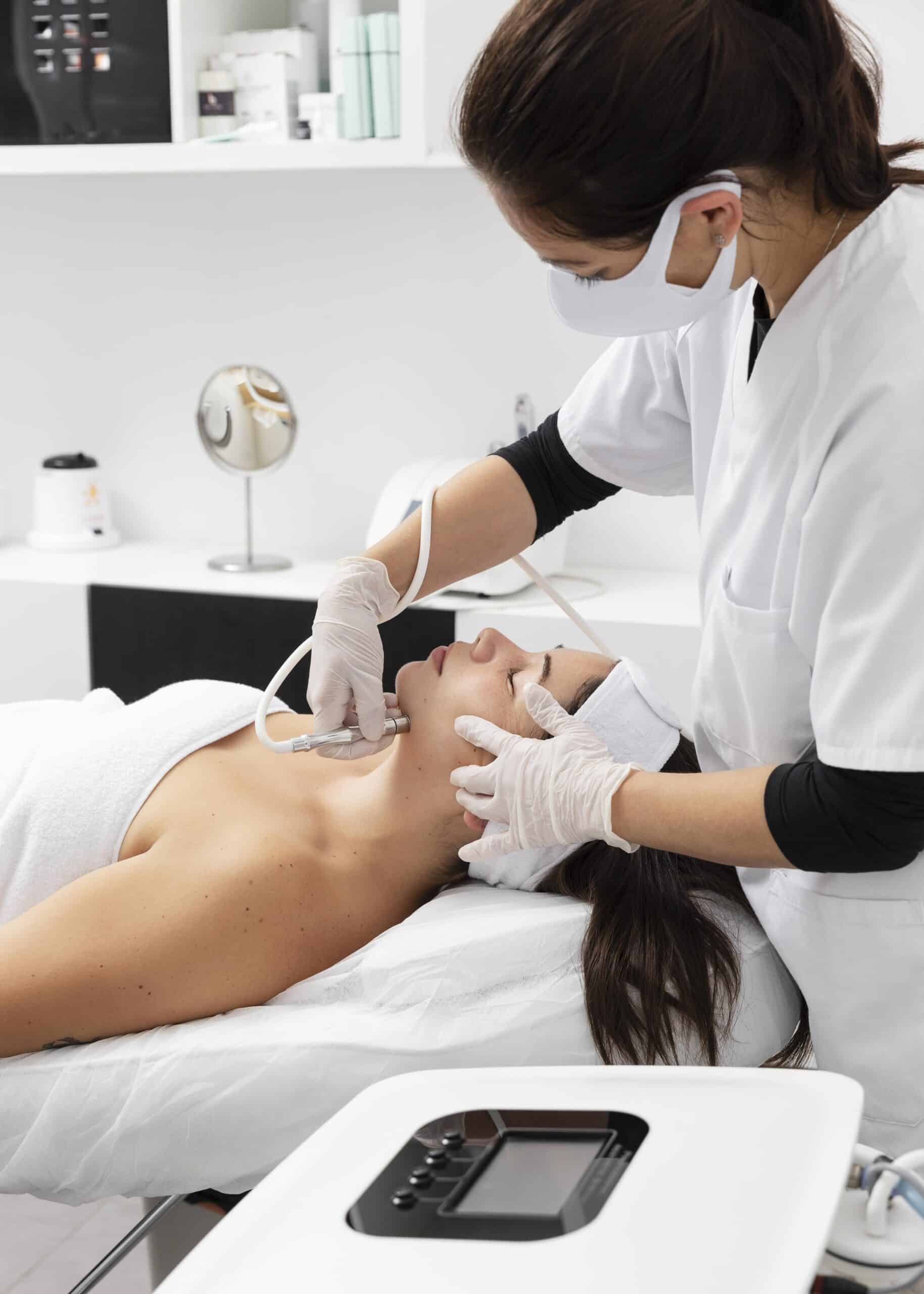 Med spa patient receiving a professional aesthetic treatment — the kind of high-intent patient whose bookings are split between competing practices when an SEO agency serves multiple clients in the same metro