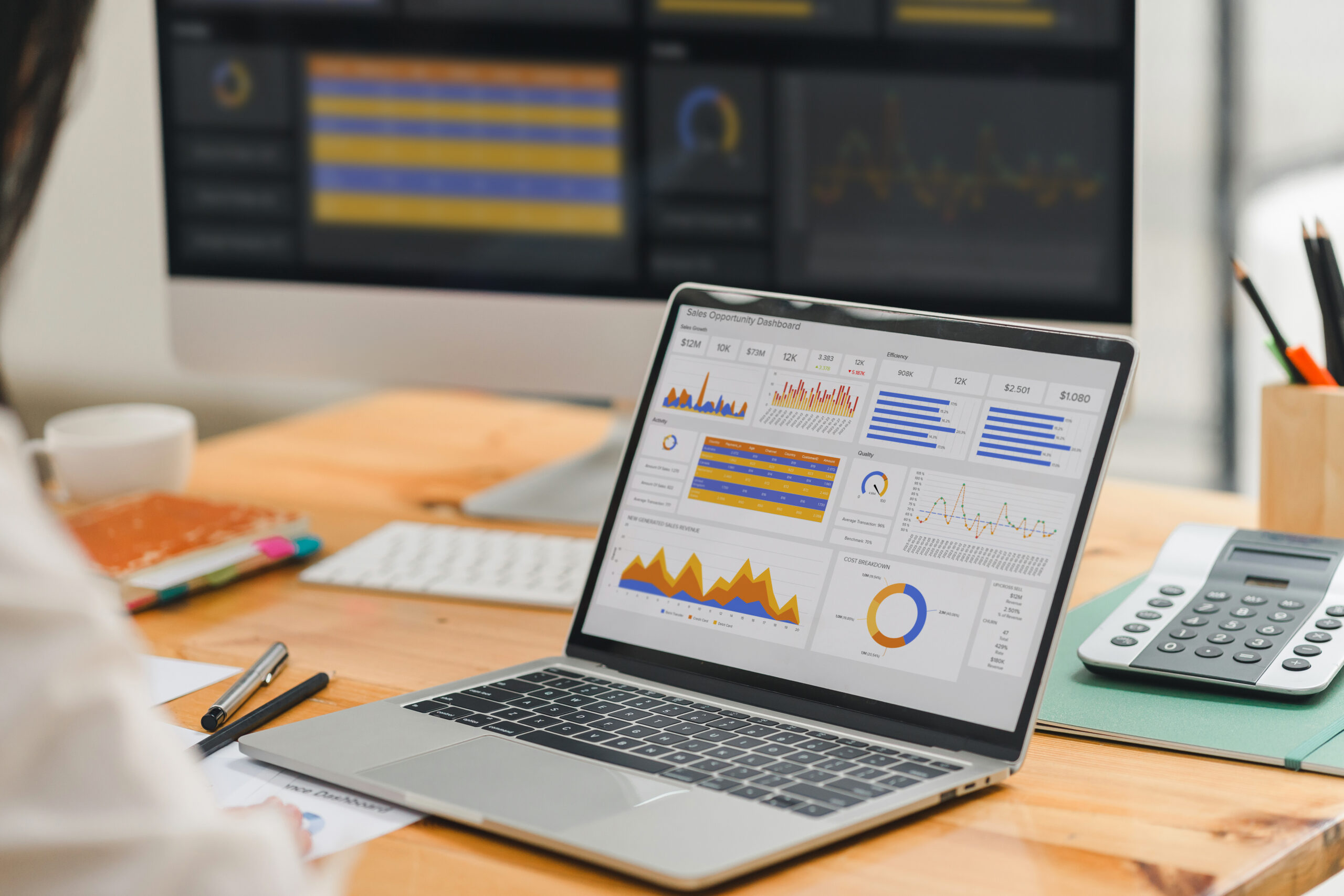 Analyzing med spa marketing agency performance and ROI on a laptop