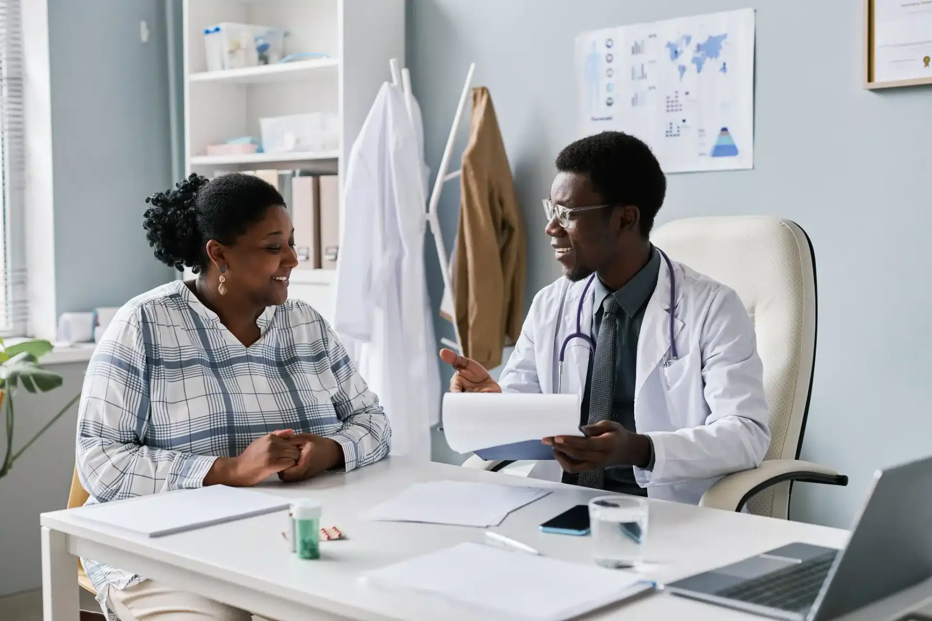 A board-certified plastic surgeon consulting with a Jacksonville patient about a cosmetic procedure