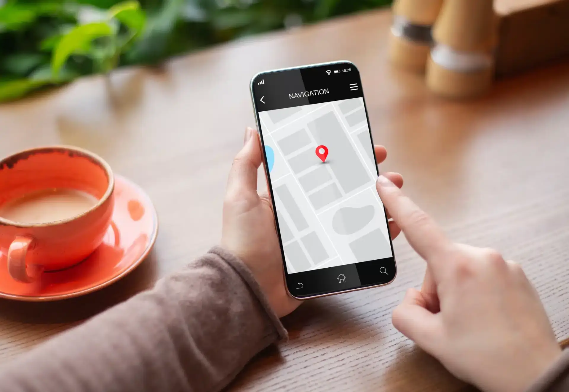 A prospective patient searching for a Jacksonville plastic surgeon by map on a phone